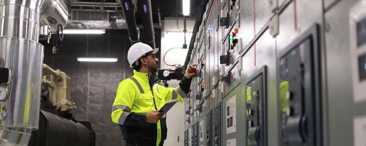 Tech looking at a chiller system