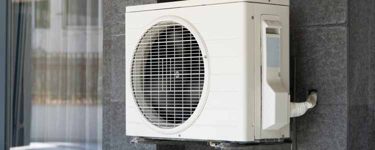 Mini Split System attached to gray wall